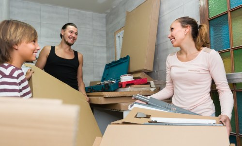 Removal team preparing furniture for a customer move