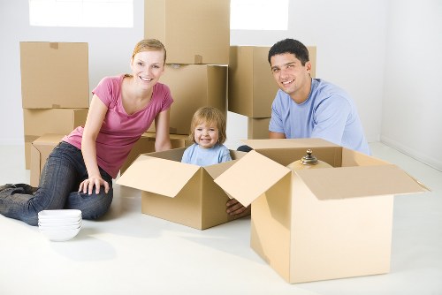Boxes and moving team in Canary Wharf apartment relocation