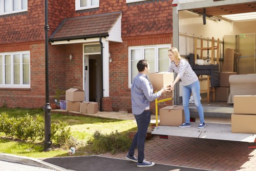 House movers planning a move in Canary Wharf with apartment access considerations