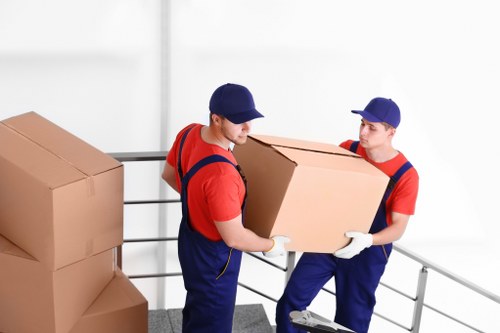 Local moving team navigating Canary Wharf access and loading areas