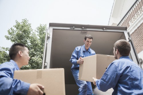 Removal team preparing a move in Canary Wharf apartment buildings