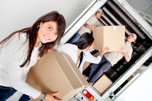 Professional movers handling office relocation in Canary Wharf