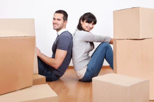 Removal team preparing a move in a Canary Wharf apartment building