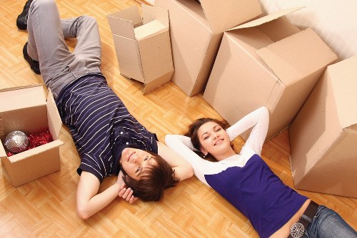 Local movers handling items near Canary Wharf buildings