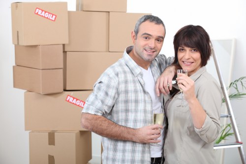 Boxes and household items being moved by a local removal team